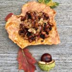 Crunchy bits for autumn cravings! brown plate on table with chestnut